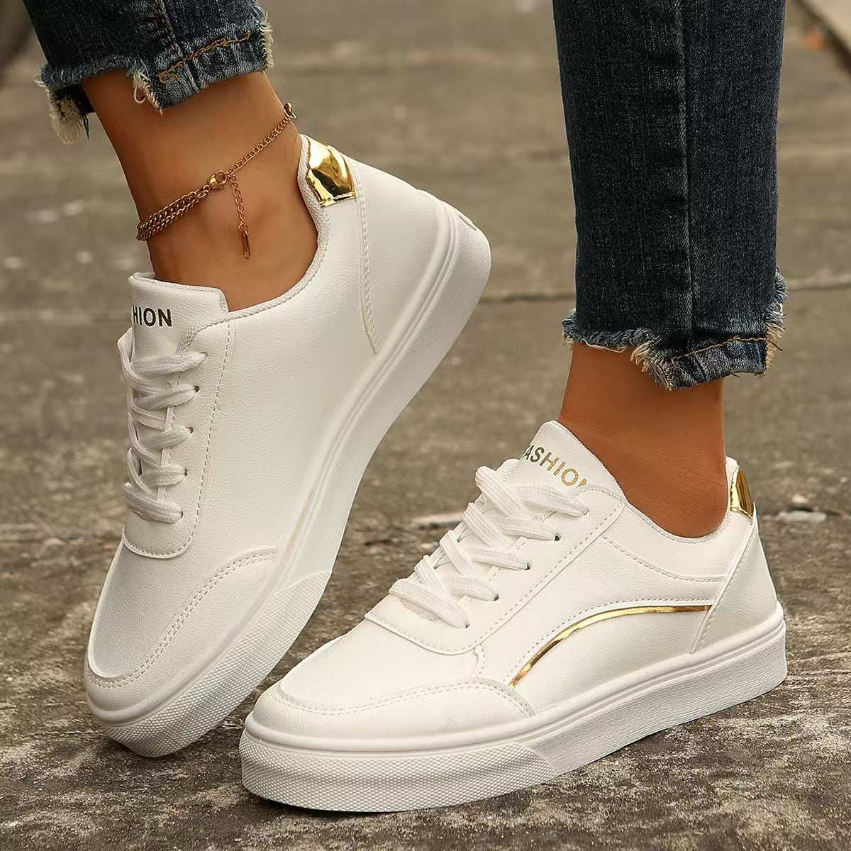 PU Leather Round Toe Flat Sneakers in white with gold accents, made of rubber and PU leather.