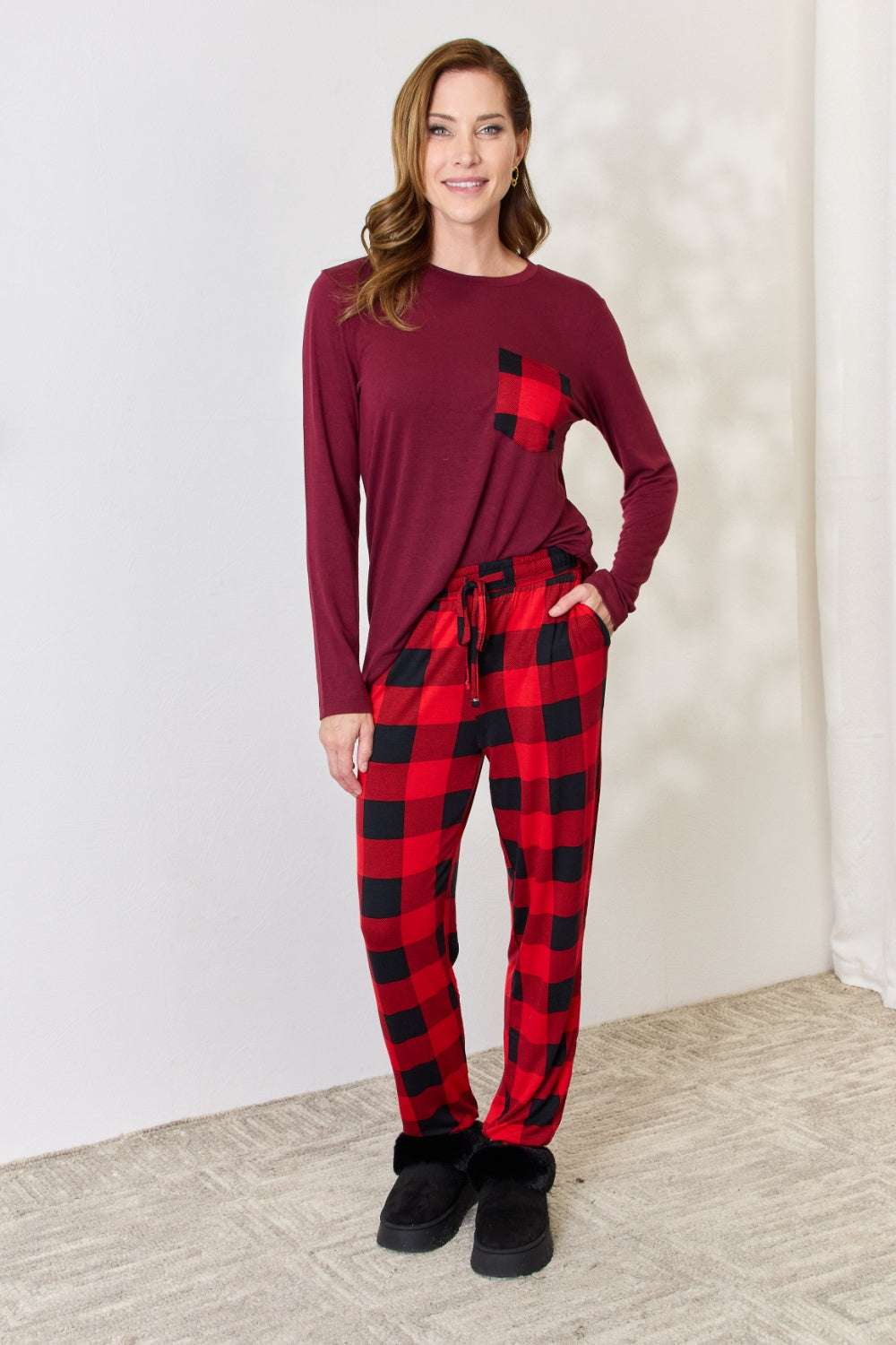 Zenana full size plaid round neck top and pants pajama set with front pocket and elastic waist.