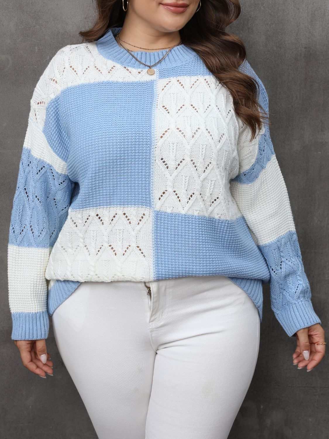 Plus size openwork color block long sleeve sweater in blue and white.