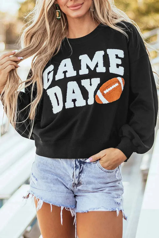 GAME DAY round neck long sleeve sweatshirt in black with football graphic, casual style.