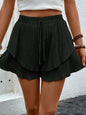 Perfee Tied Layered High Waist Shorts, ruffled polyester, opaque, black color.