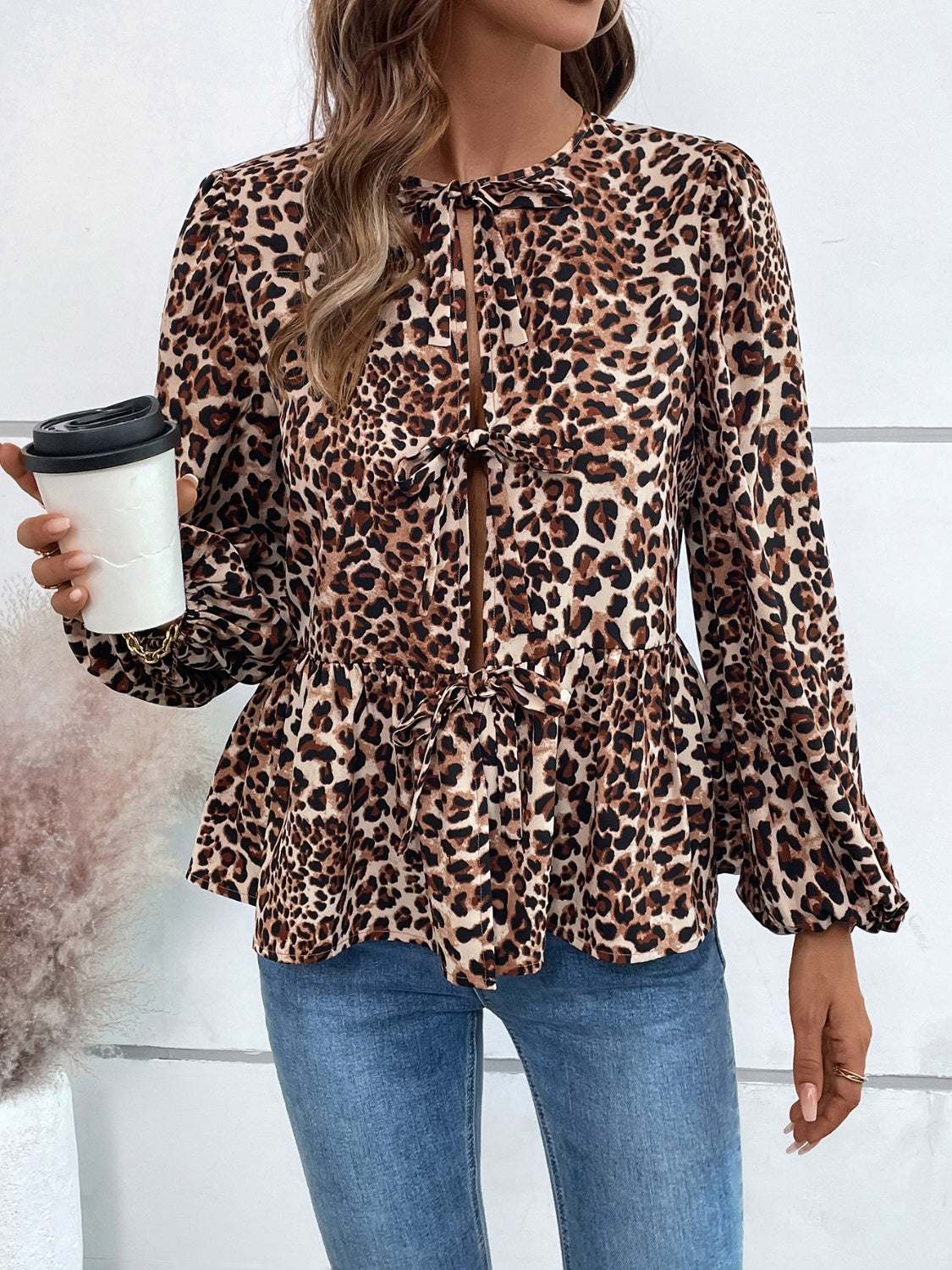 Ivy Lane Peplum Tied Long Sleeve Blouse