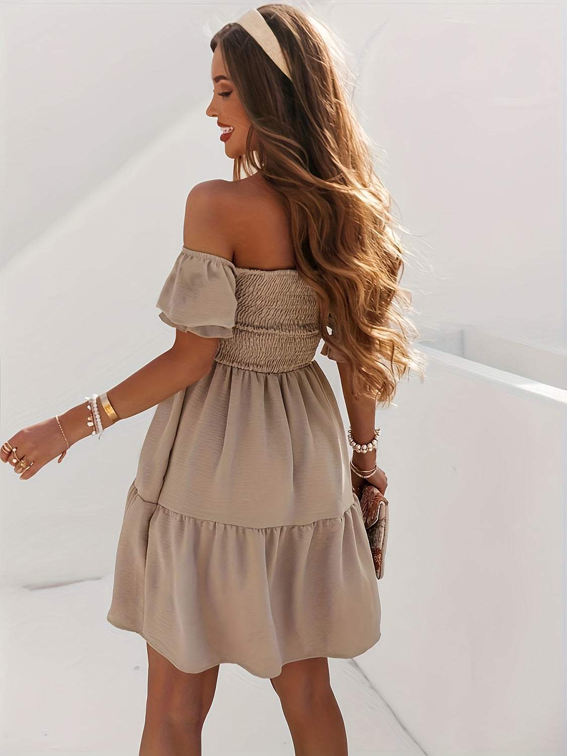 Full-size ruffled off-shoulder short sleeve dress in beige with ruched detail.