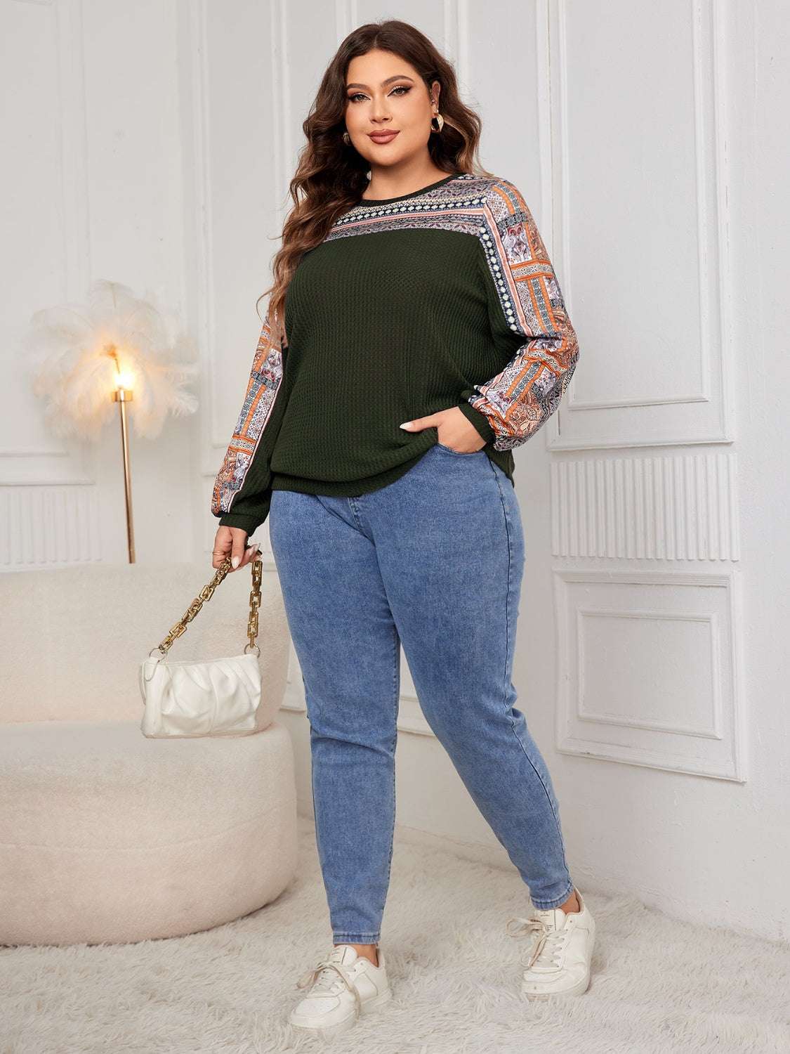 Plus size printed long sleeve sweatshirt in a basic style with slightly stretchy fabric.