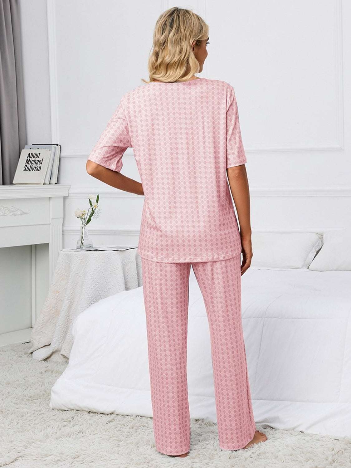 Printed V-Neck Top and Pants Lounge Set in pink, featuring a basic style and slightly stretchy polyester material.