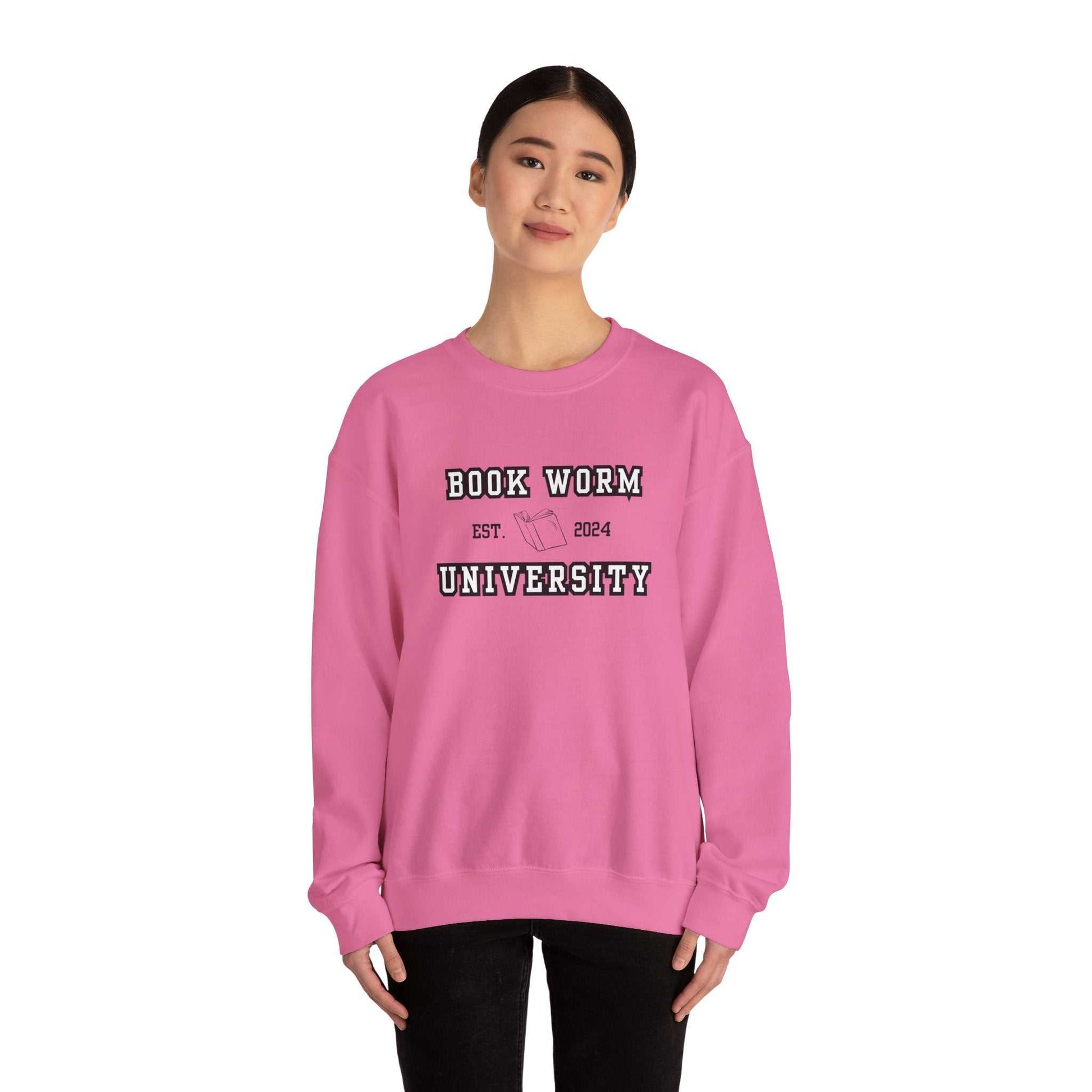 Bookworm University Crewneck Sweatshirt in pink with 'Est 2024' design.