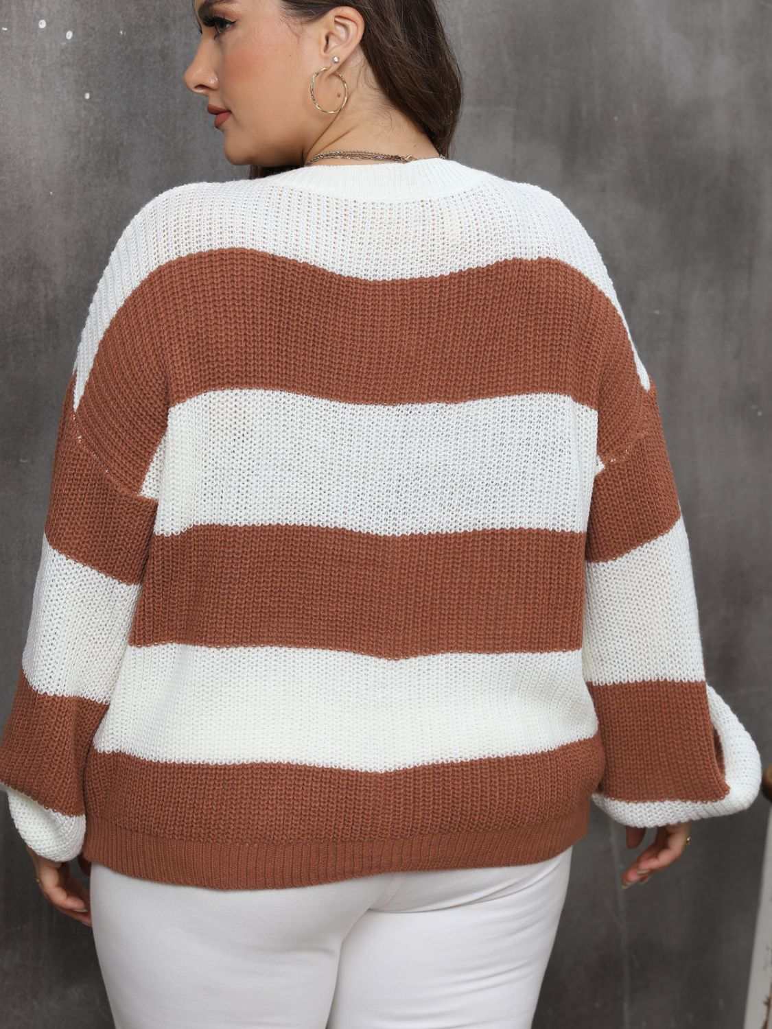 Plus size striped round neck long sleeve sweater in brown and white.