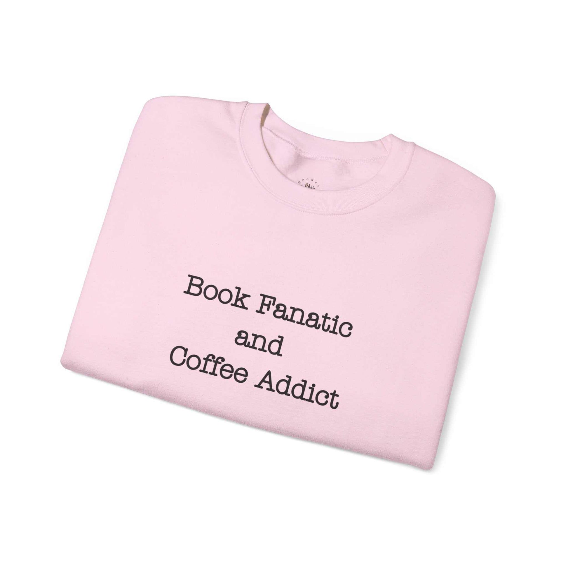 Unisex crewneck sweatshirt with "Book Fanatic and Coffee Addict" text, coffee cup design, cozy cotton-polyester blend.