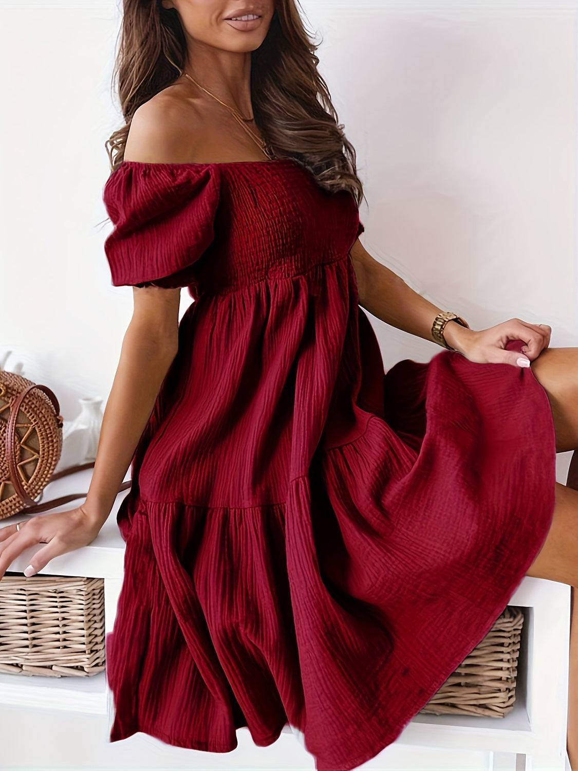 Full size ruffled off-shoulder short sleeve dress in red, featuring ruching and slightly stretchy fabric.