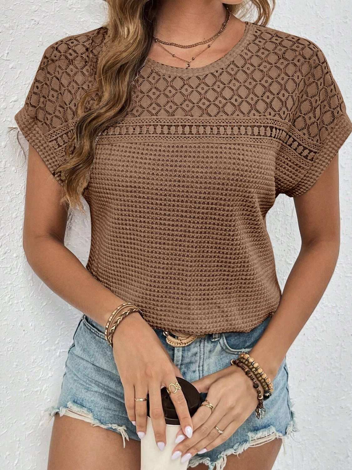 Waffle-knit round neck short sleeve top with lace detail, semi-sheer, shown in brown.