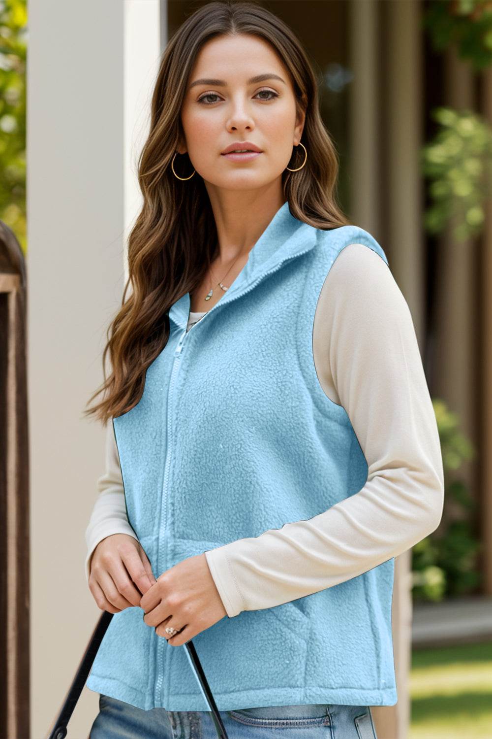 Light blue zip up vest coat with pockets, women's fashion.