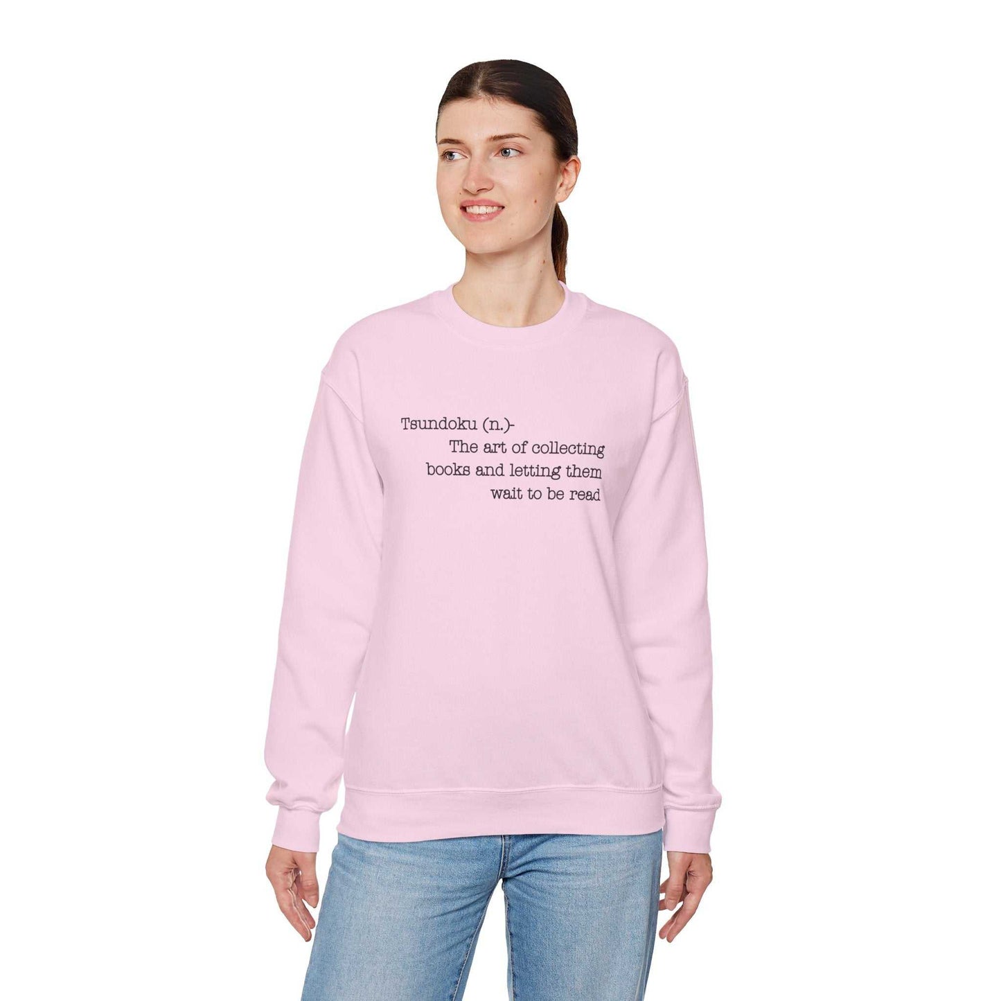 Tsundoku crewneck sweatshirt with book-themed design, cozy cotton-polyester blend.