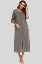 Slit round neck night dress with zip-up front and pockets.