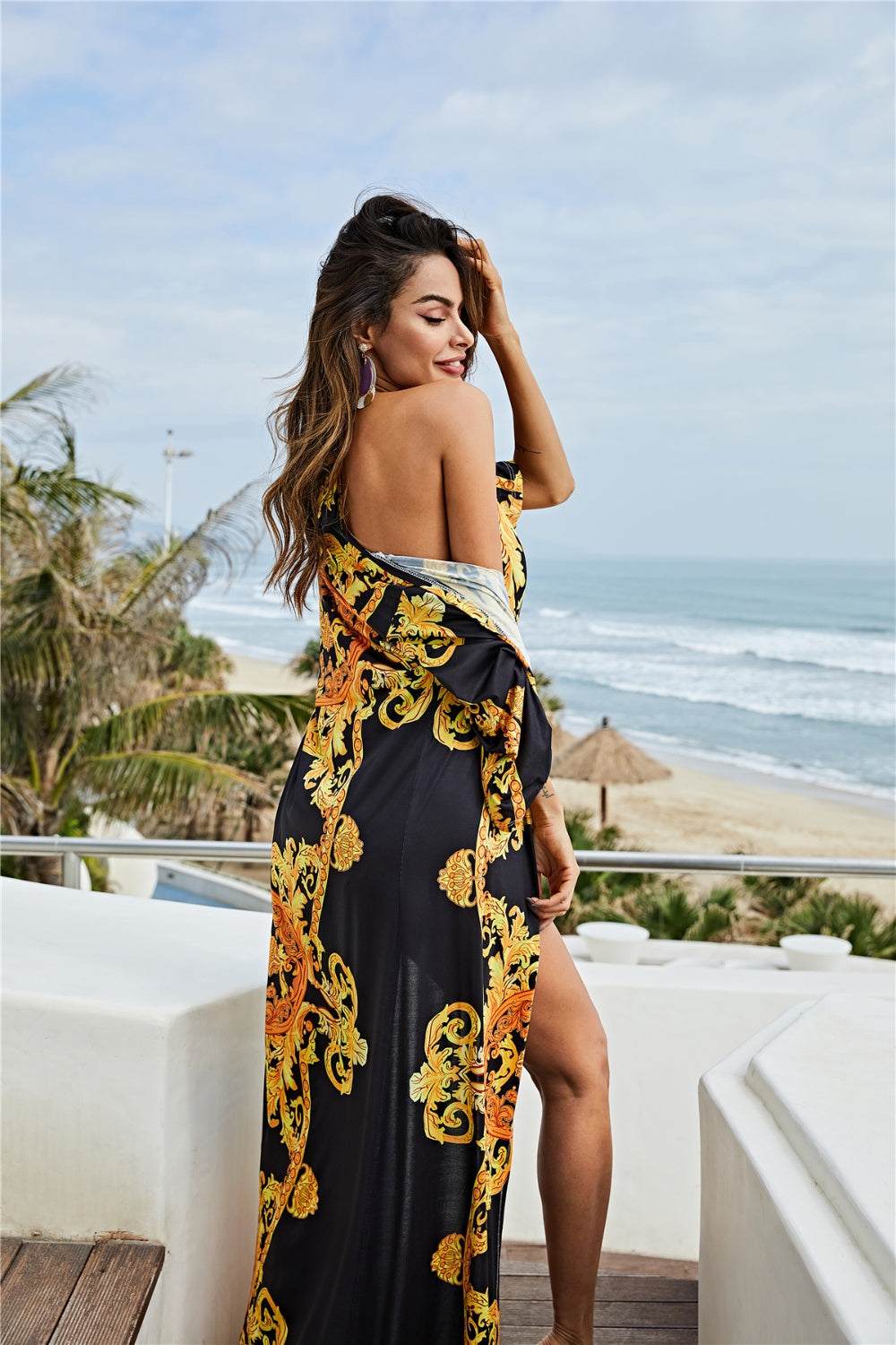 Printed plunge one-piece and cover-up swim set with vibrant design.