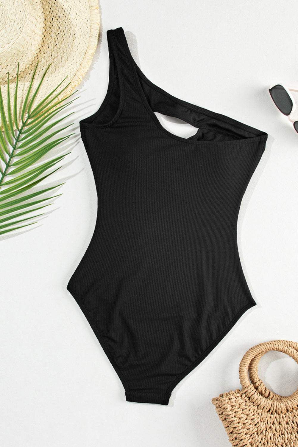 Cutout one shoulder sleeveless one-piece swimwear in black with removable padding and stretchy material.