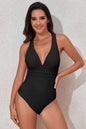 Crisscross wide strap one-piece swimwear with removable padding and stretchy fabric.