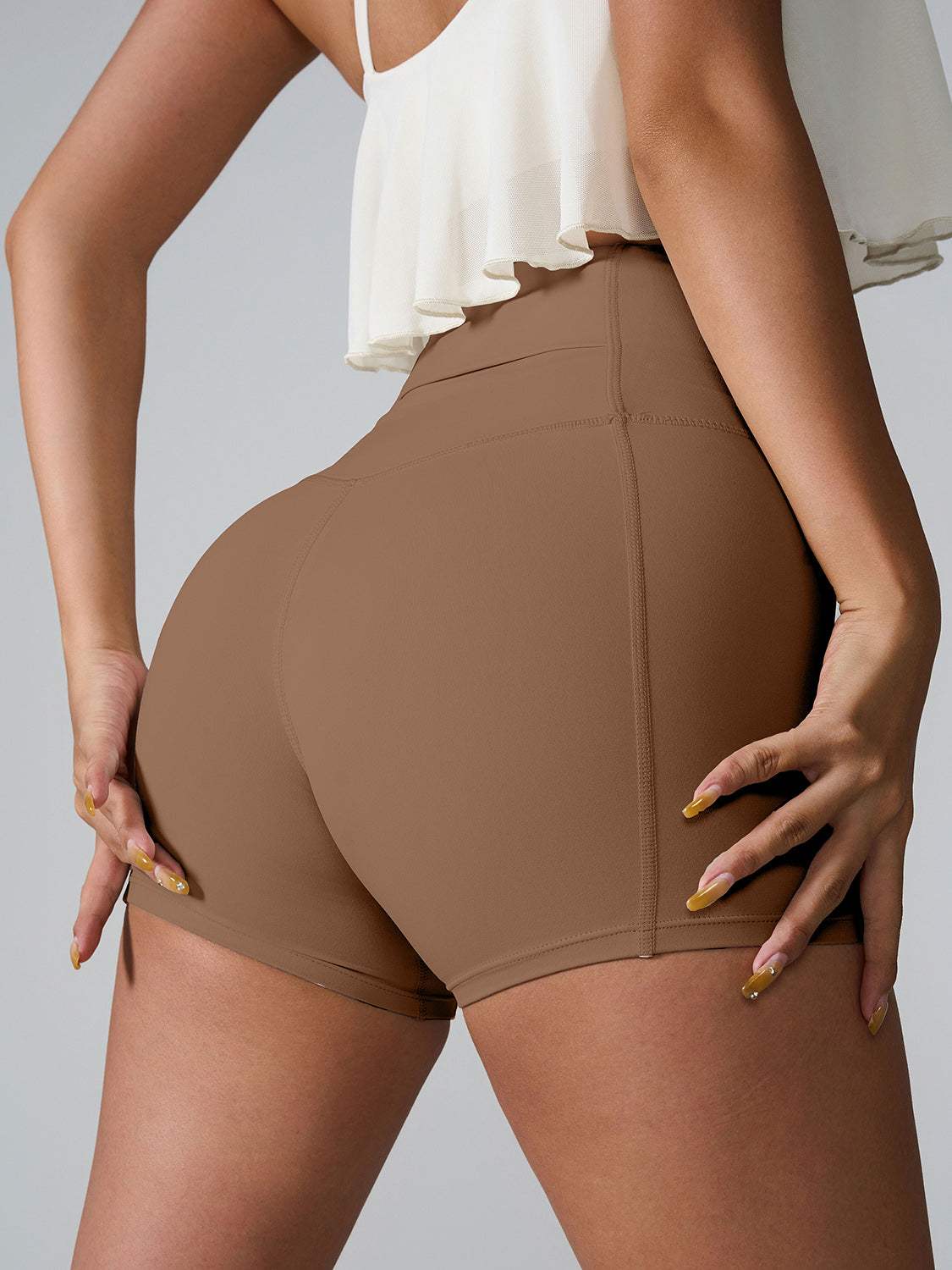 High waist active shorts with pockets and a stretchy fit.