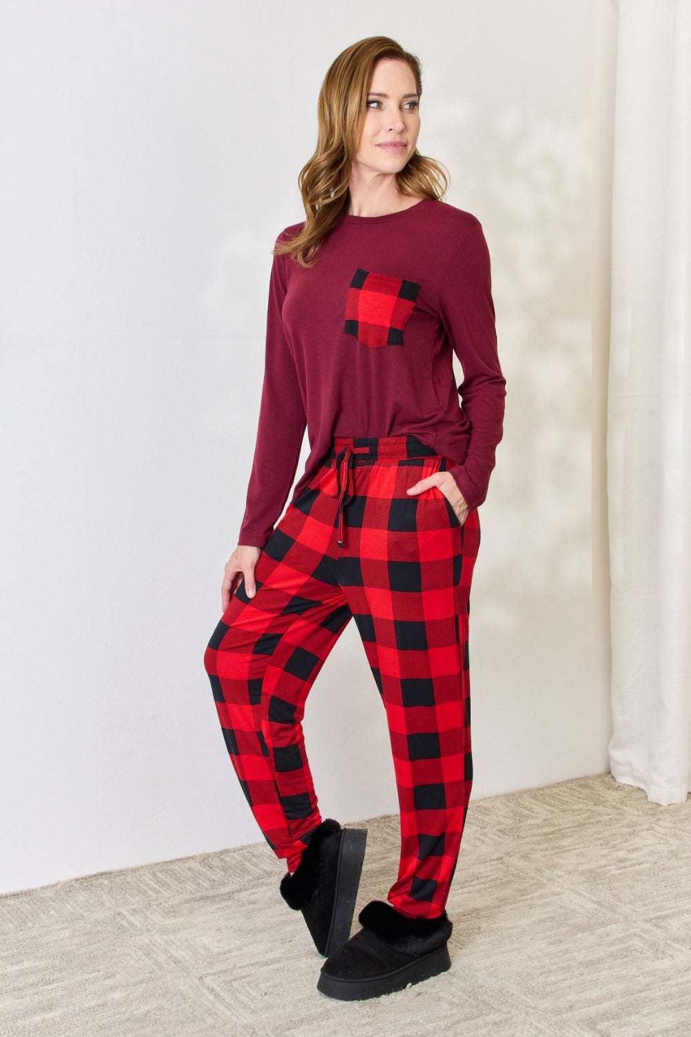 Zenana full size plaid round neck top and pants pajama set with side slits and drawstring waist.