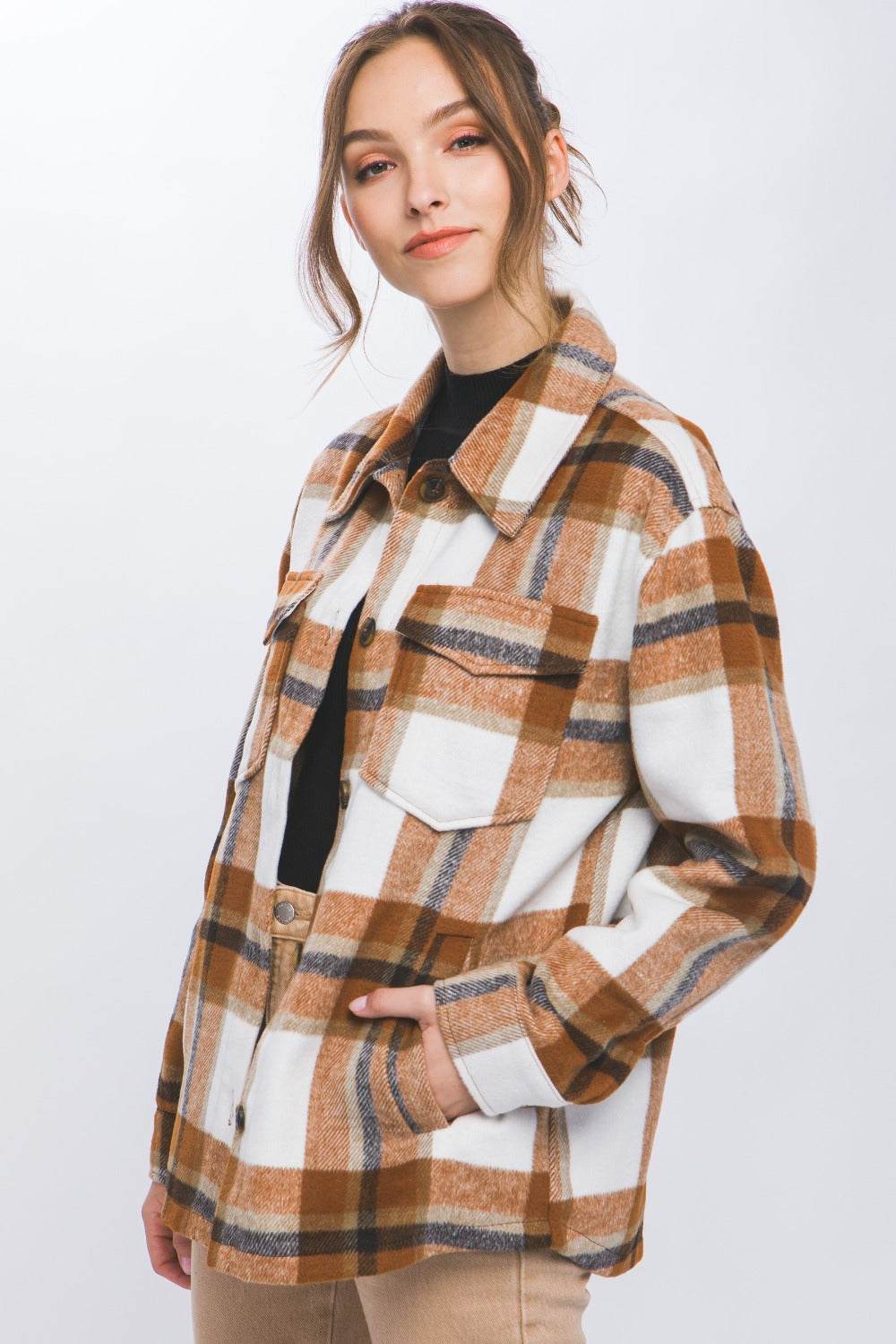 Love Tree Plaid Button Up Shacket with classic plaid pattern and button-up design.