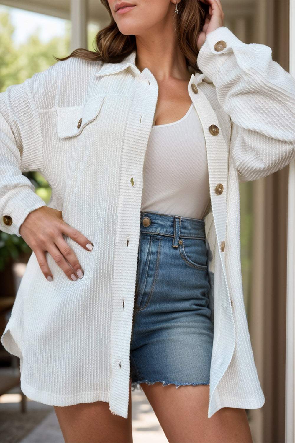 Plus size button-up long sleeve jacket in white, featuring buttoned details and casual style.