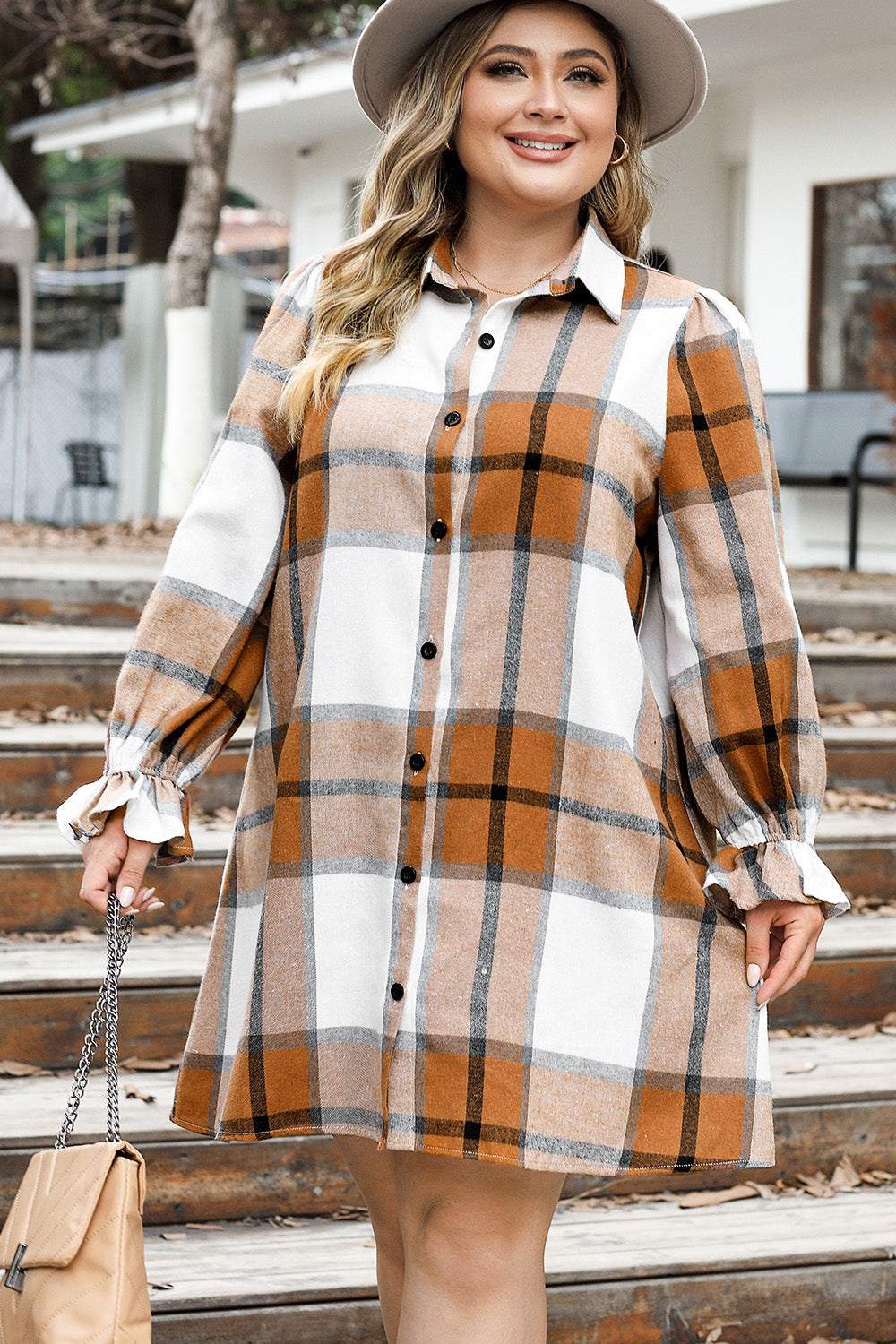 Size plaid button-up shirt dress with buttoned front and slightly stretchy material.