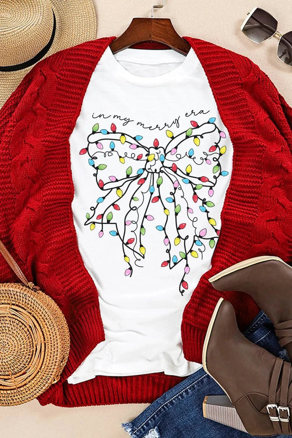 Full Size Bow Round Neck Short Sleeve T-Shirt with colorful bow design, styled with brown boots and red sweater.