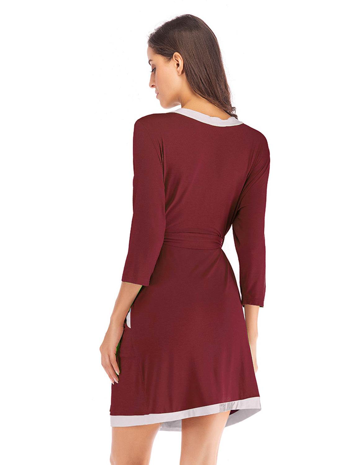 Women's tie waist surplice neck robe with pockets in burgundy.