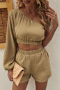 Honey-colored one-shoulder balloon sleeve crop top and shorts set with ruched details.