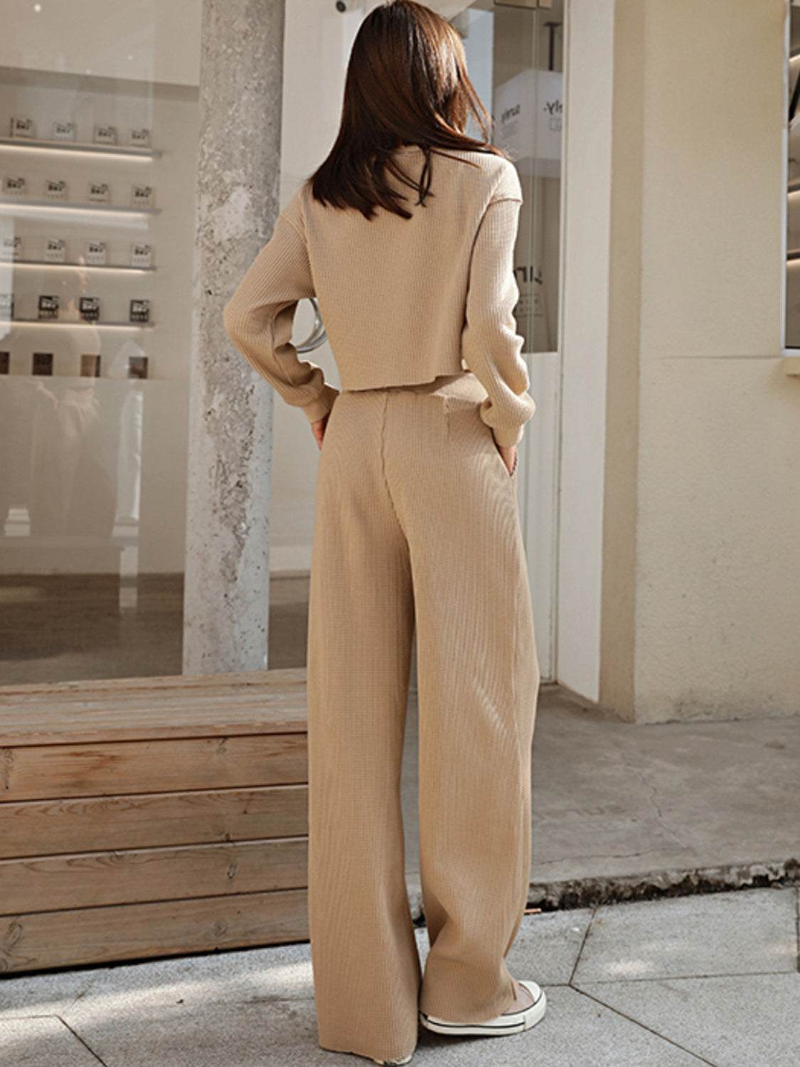 Waffle-knit round neck top and pants set for women, beige color, two-piece outfit.