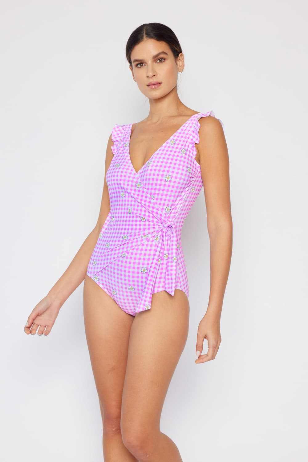 Marina West Swim's ruffle faux wrap pink plaid one-piece swimsuit with floral accents.