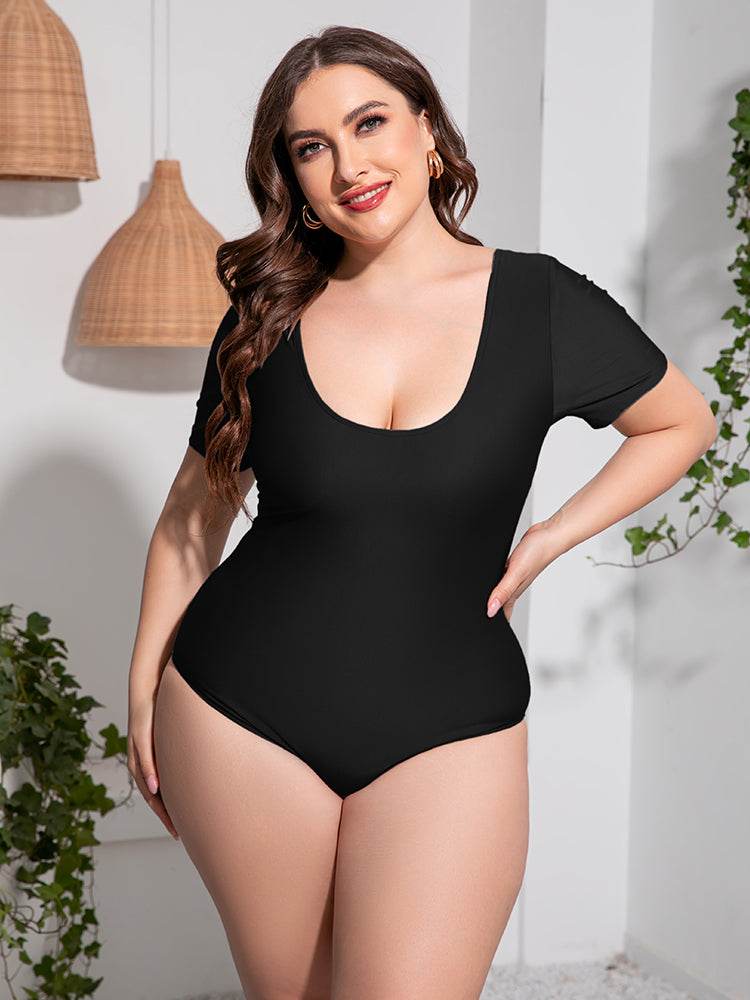 Plus size scoop neck short sleeve one-piece swimsuit, solid pattern, stretchy polyester-spandex blend, beach style.