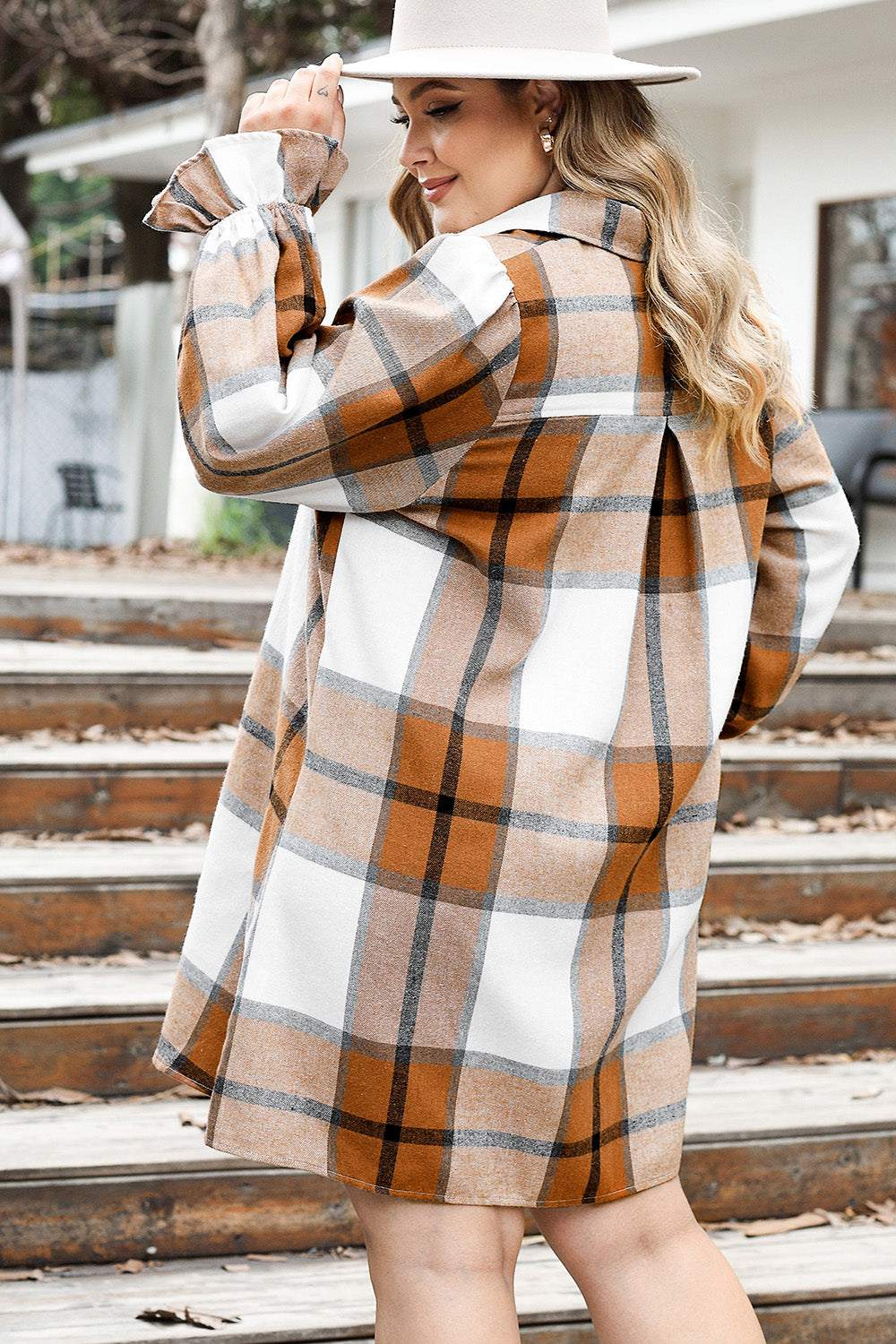 Size plaid button up shirt dress with buttoned front, slightly stretchy fabric, and plaid pattern.