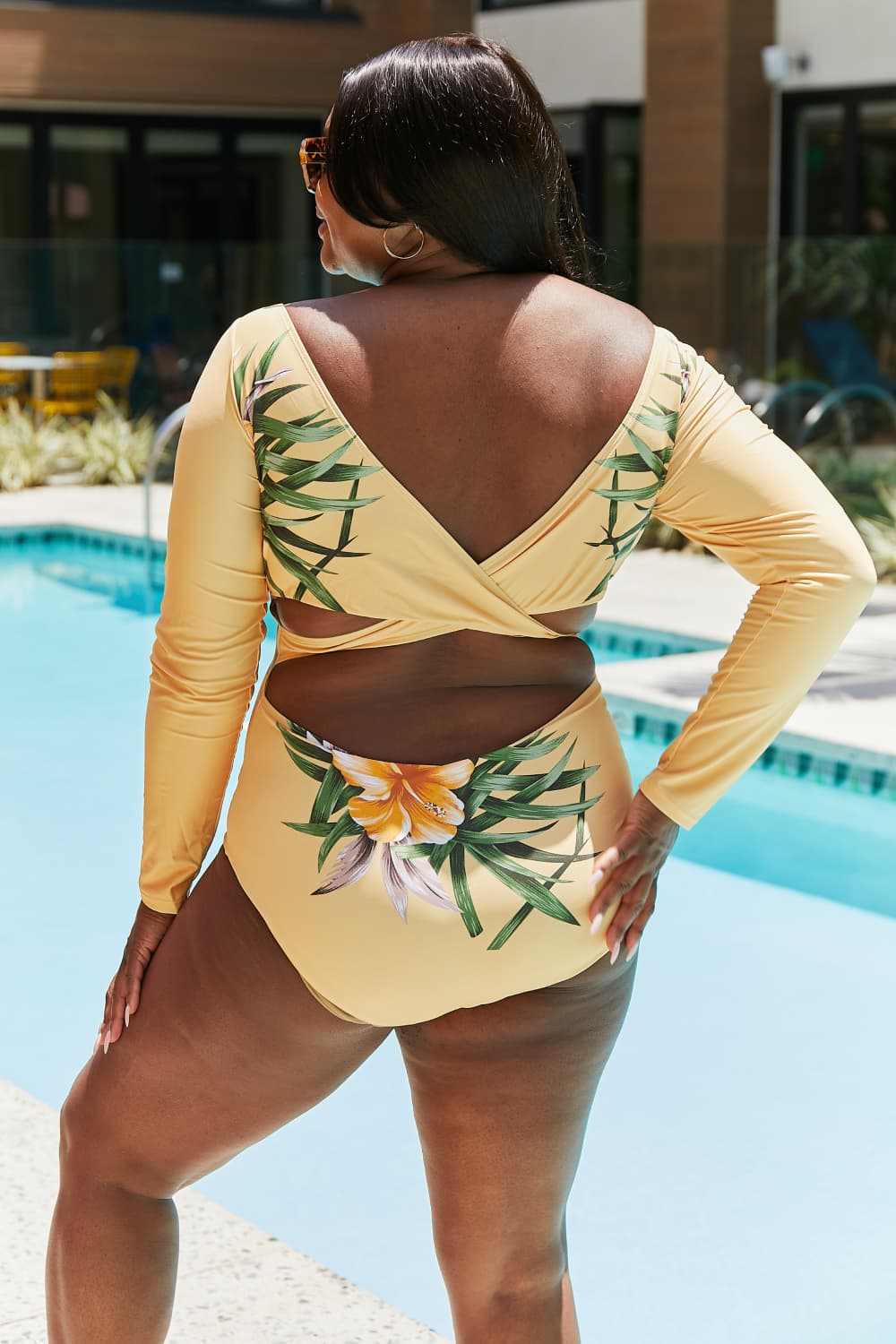 Marina West Swim Cool Down Longsleeve One-Piece Swimsuit with tropical floral print, providing UV protection and full coverage.