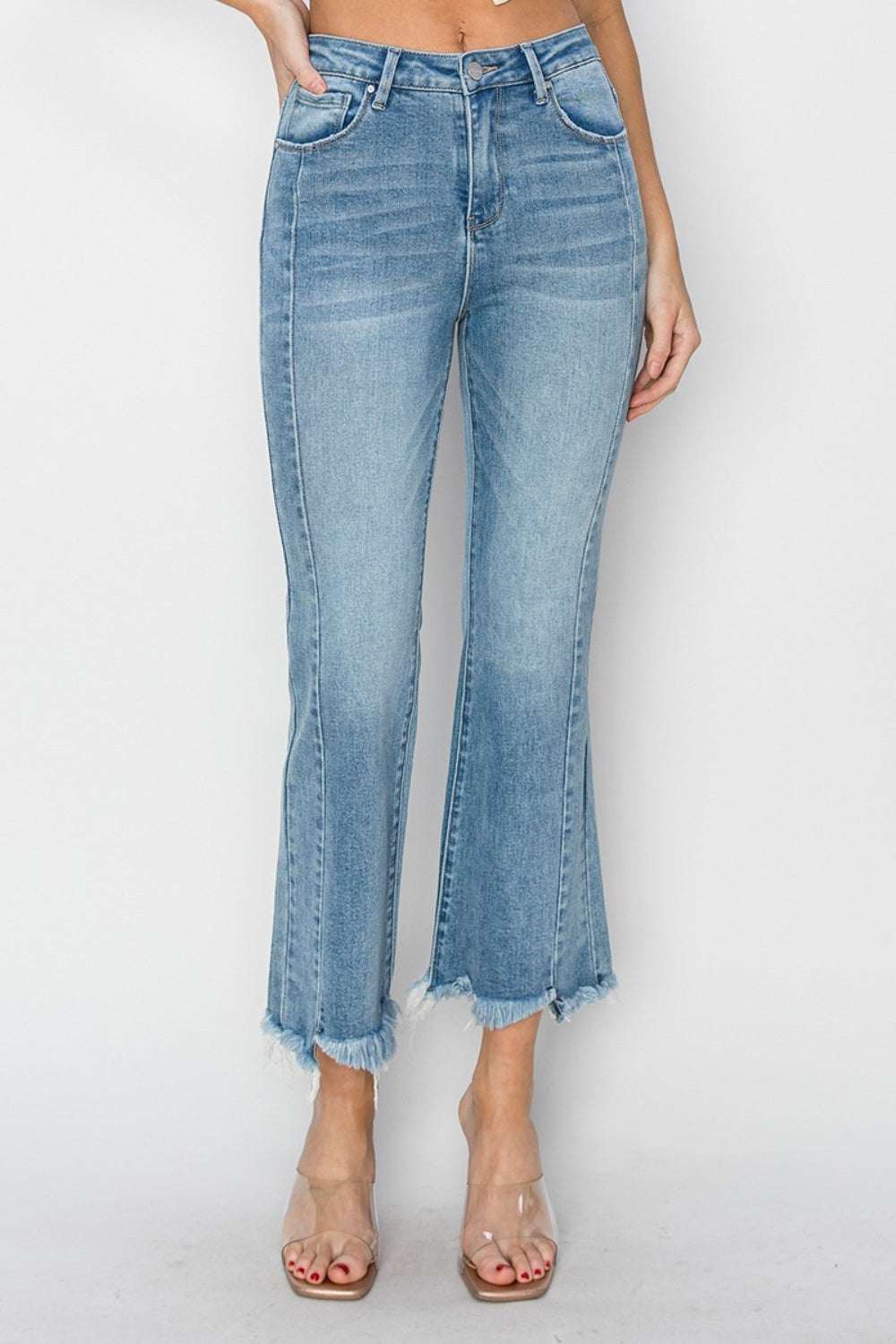 RISEN high rise frayed hem flare jeans with a trendy bohemian style.