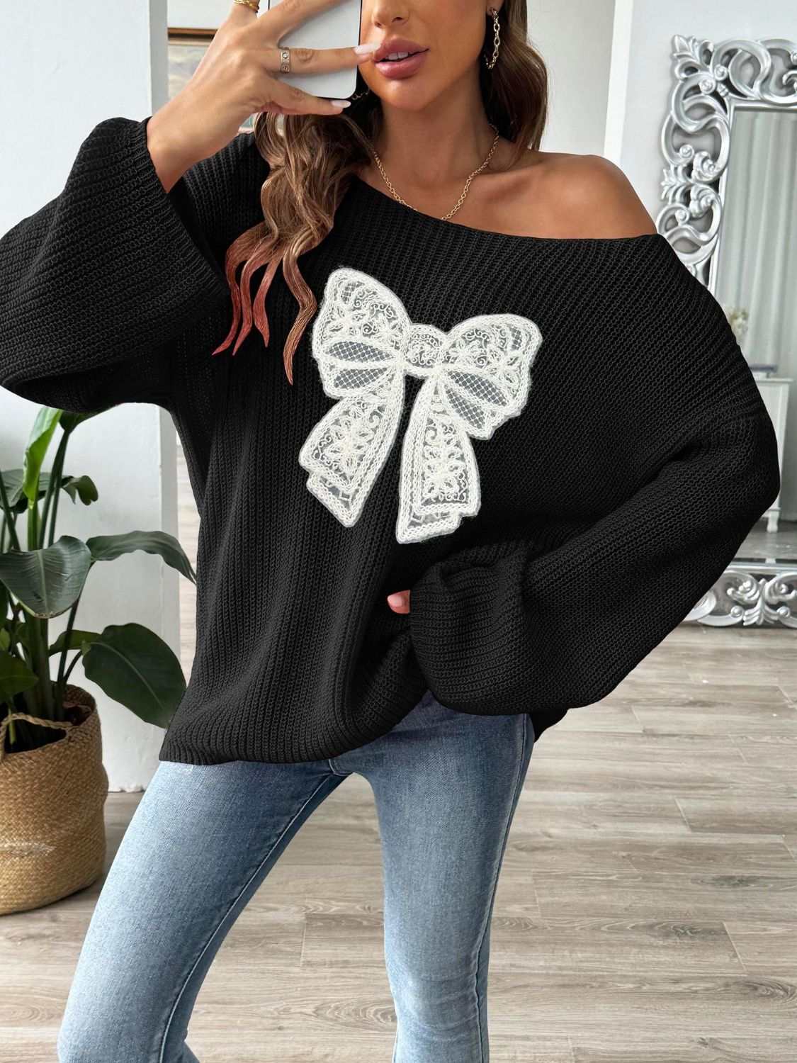 Bow Boat Neck Long Sleeve Sweater with lace bow design, black, slightly stretchy polyester.