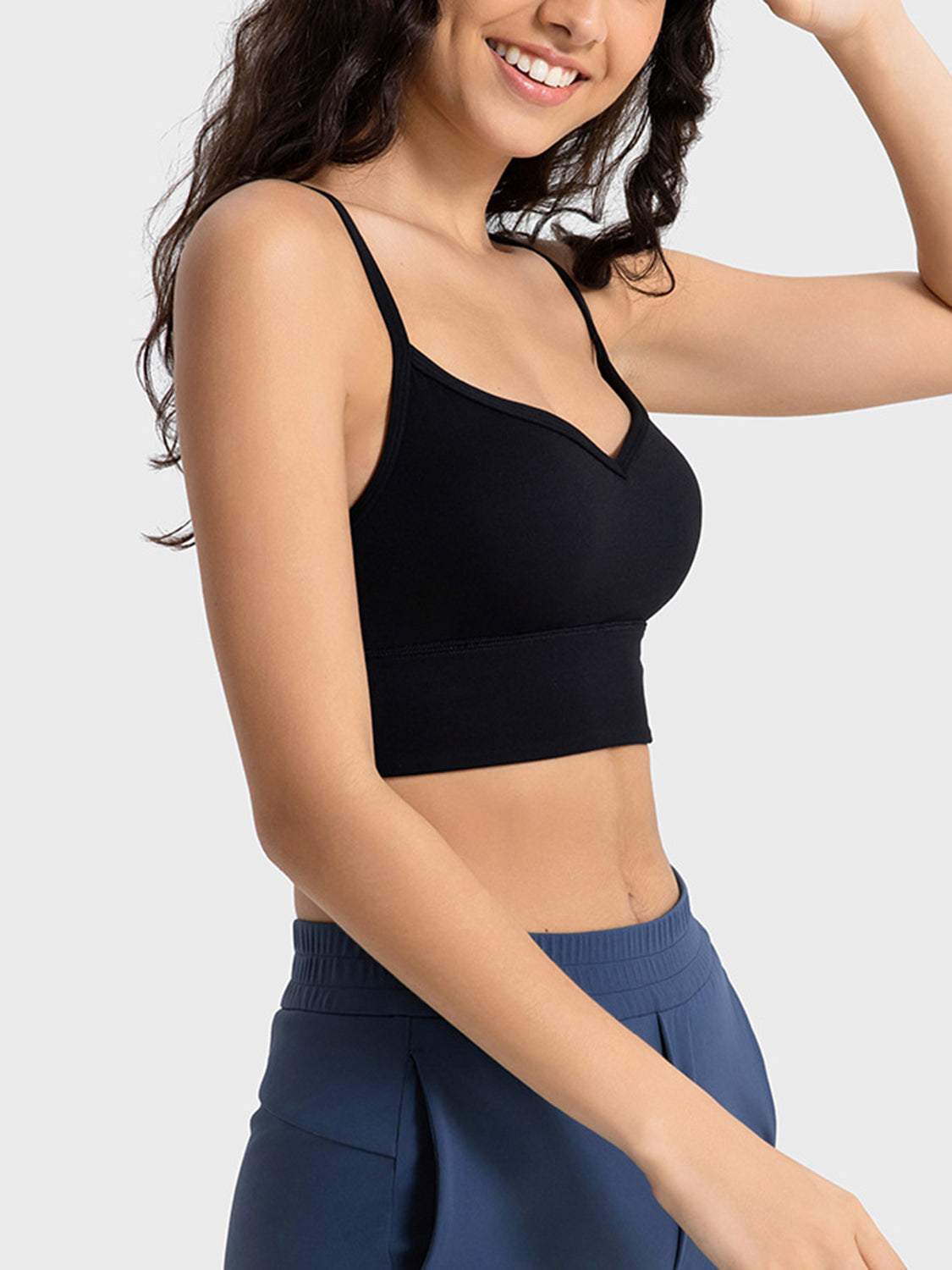 Millennia Spaghetti Strap Sport Bra with removable padding and stretchy nylon-spandex blend.