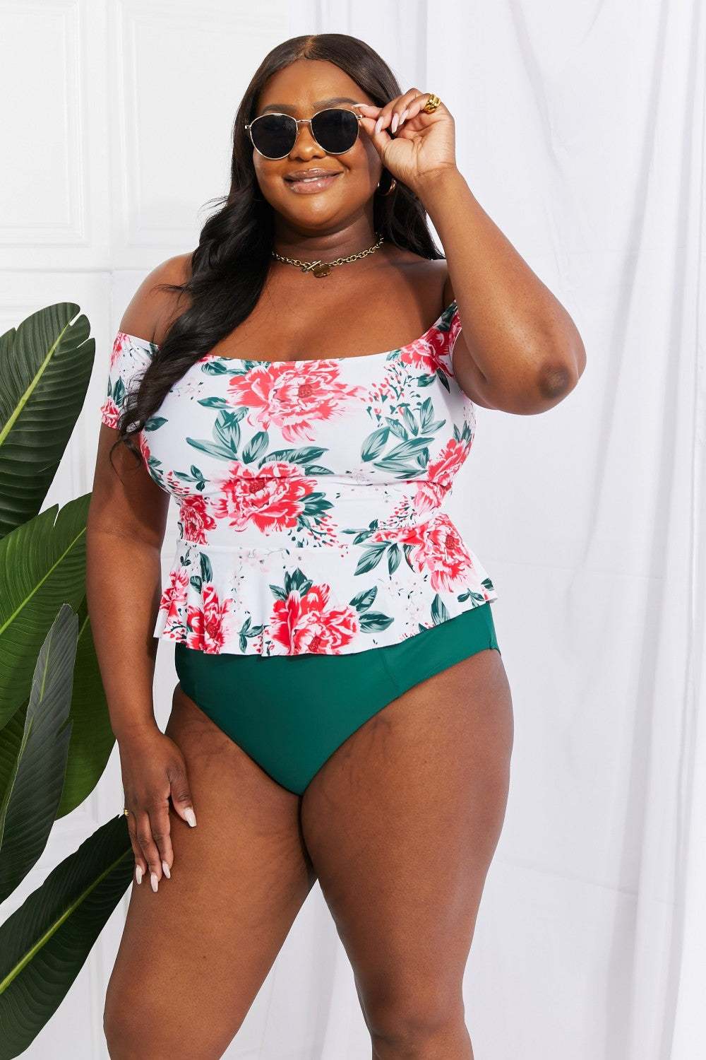 Marina West Swim Coastal Cutie off-shoulder floral tankini set with ruffle peplum and high-waisted bottoms.