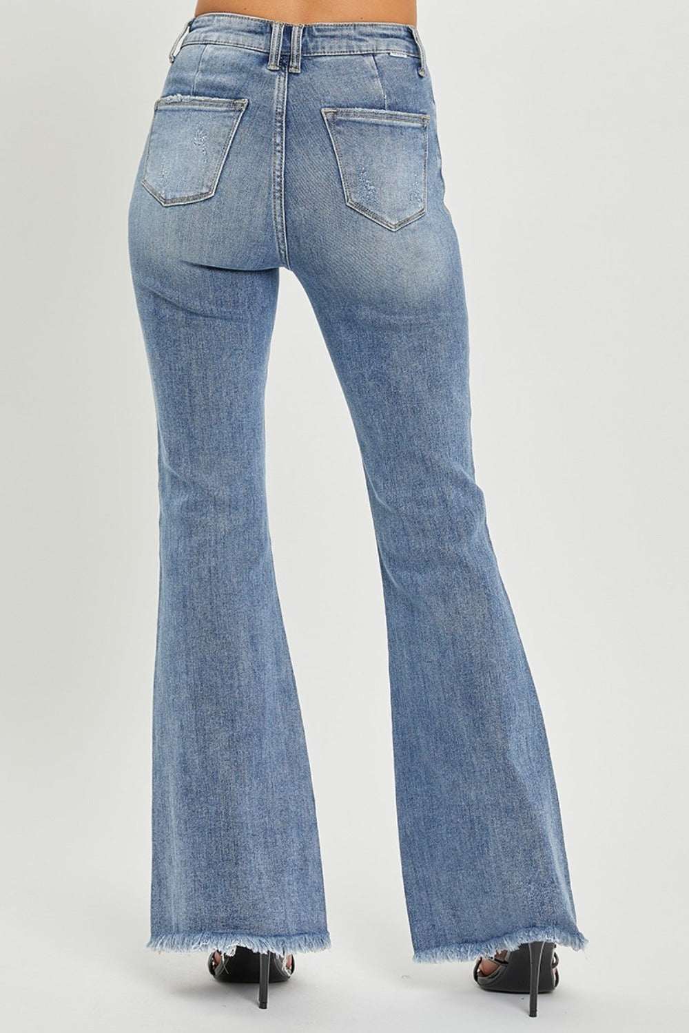 RISEN full size high waist raw hem flare jeans with pocketed design and slightly stretchy denim.