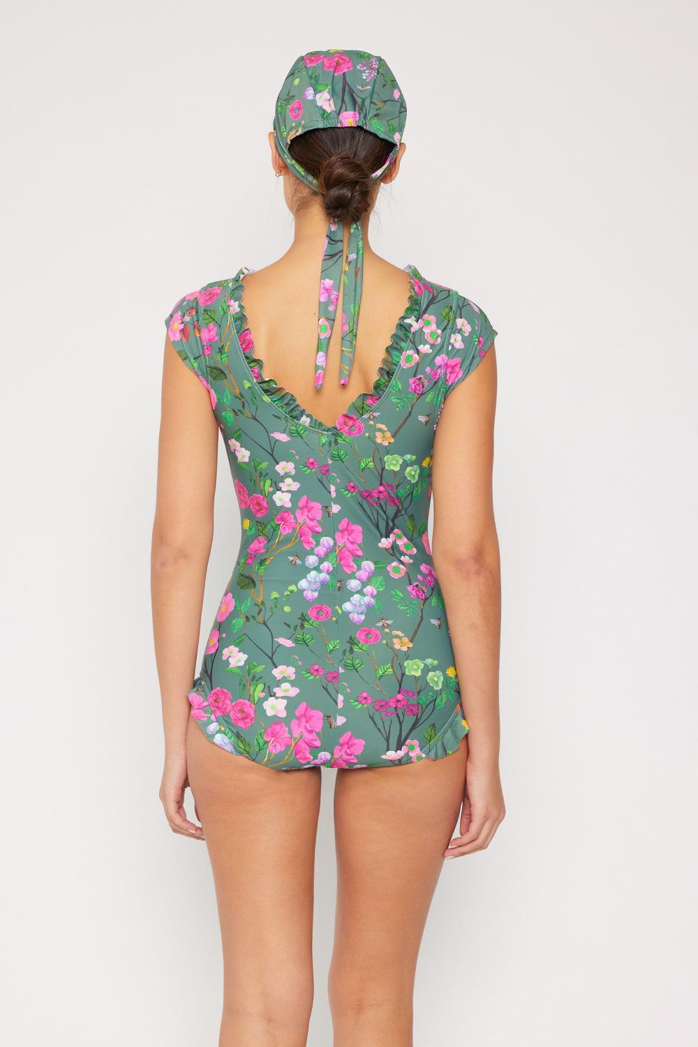 Marina West Swim Bring Me Flowers V-Neck One Piece Swimsuit in sage with floral pattern and lace-up detail.