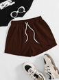 Brown drawstring pocketed elastic waist shorts made of 100% polyester.