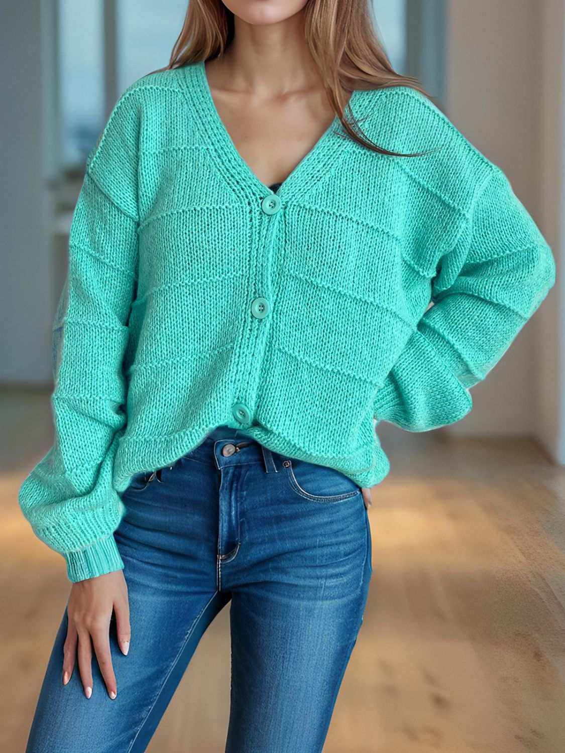 Button down V-neck long sleeve cardigan in mint green, slightly stretchy fabric.