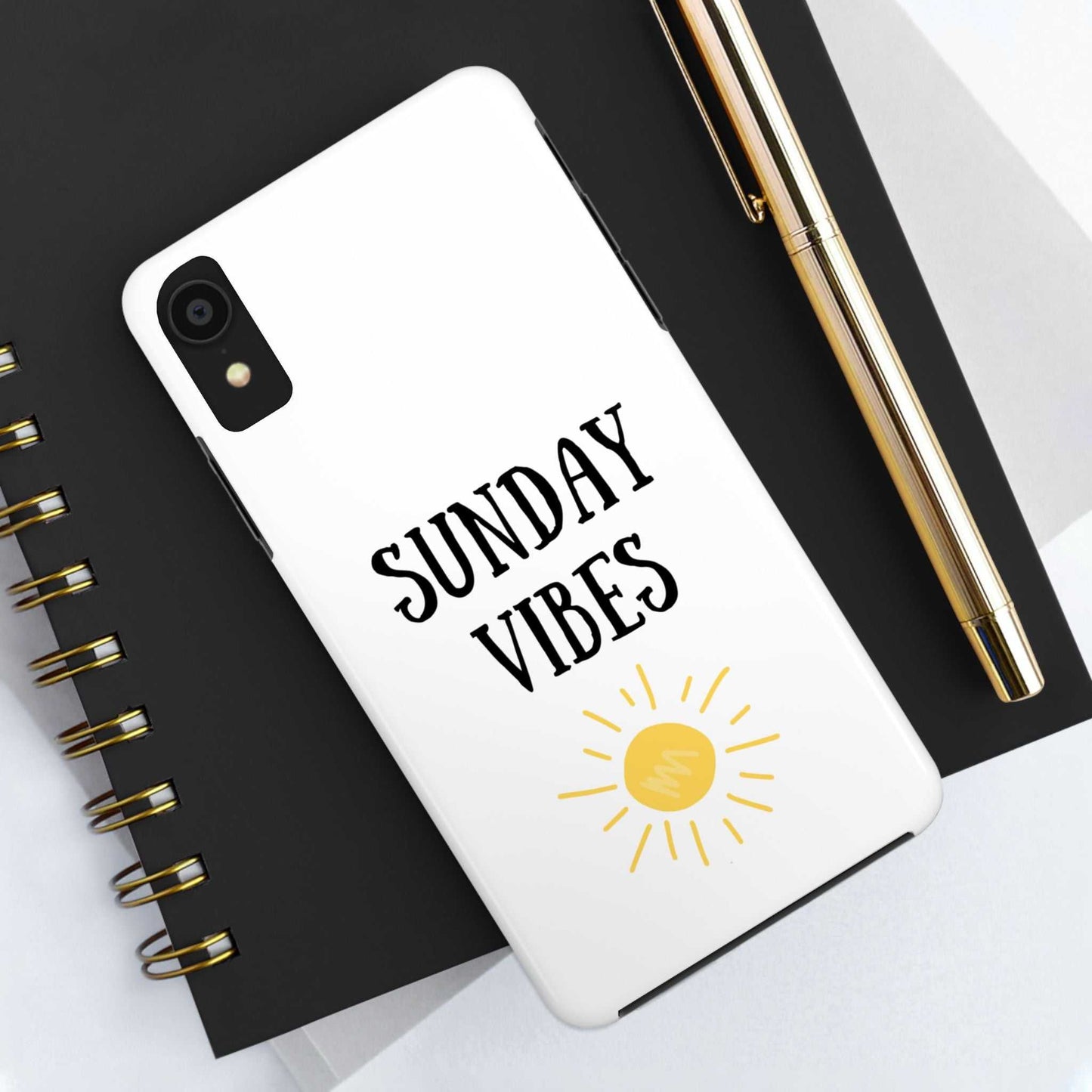 Phone case with 'Sunday Vibes' sun graphic, durable Lexan plastic, glossy finish.