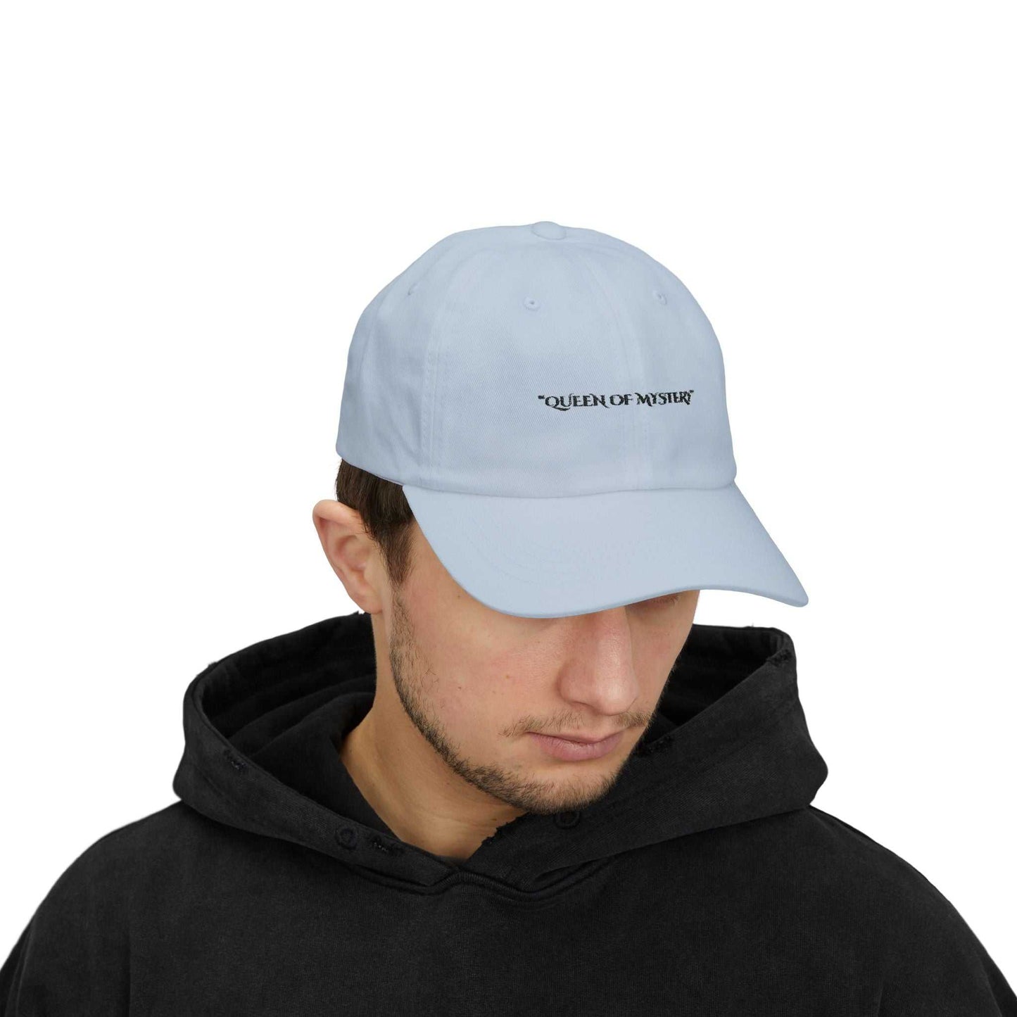 Classic Dad Cap with "Queen of Mystery" slogan, featuring 6-panel structure and precurved visor, adjustable fit.