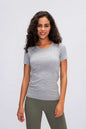 Millennia Round Neck Short Sleeve Active T-Shirt, gray, model wearing activewear.