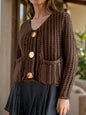 Brown button-down long sleeve cardigan made of 100% acrylic, slightly stretchy, basic style.