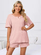 Notched short sleeve and shorts lounge set in light pink.