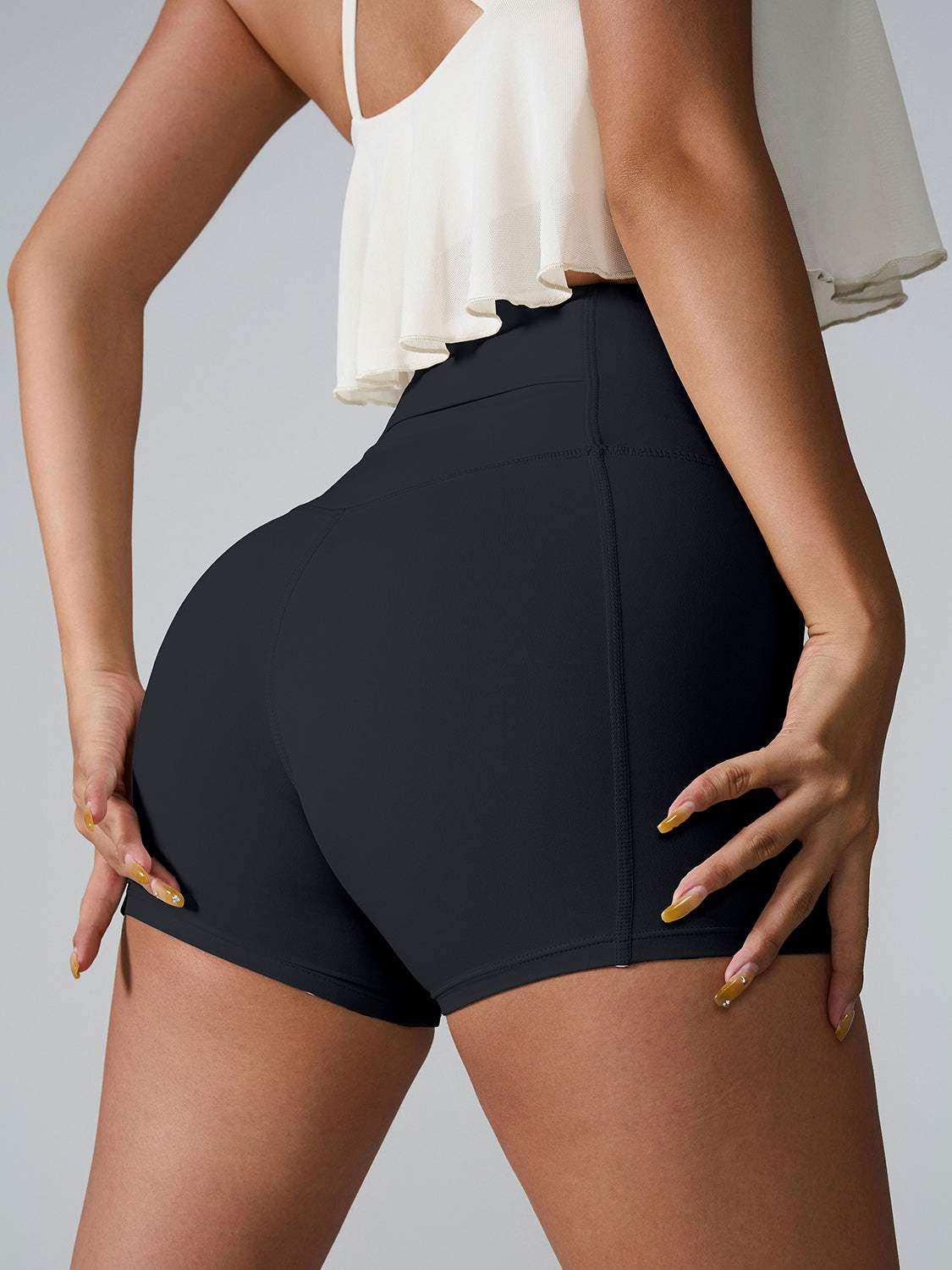 High Waist Active Shorts with pockets, stretchy nylon-spandex material.