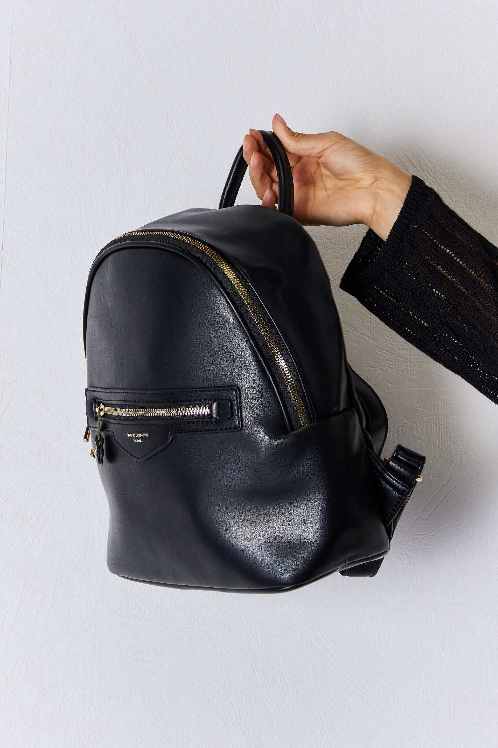 David Jones PU Leather Backpack with sleek design and ample storage.