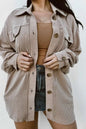 Plus size button up long sleeve jacket in beige with front pockets.