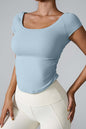 Round Neck Short Sleeve Active T-Shirt in light blue, stretchy nylon-spandex blend.